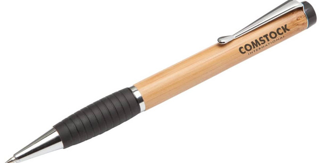 A bamboo pen with a black rubber grip and metallic accents. Features branding on the barrel.