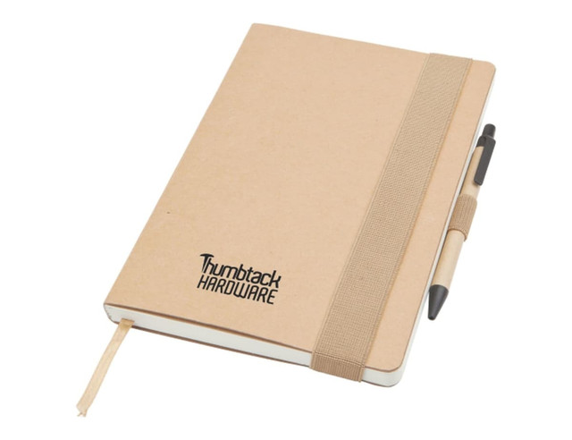 A large A5 notepad in natural tones with a pen attached and a logo on the cover.