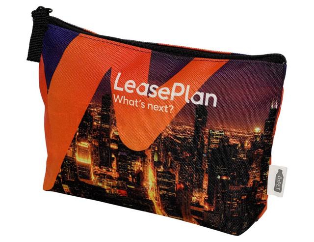 A vibrant orange and black toiletry pouch featuring a city skyline design and a branded logo.