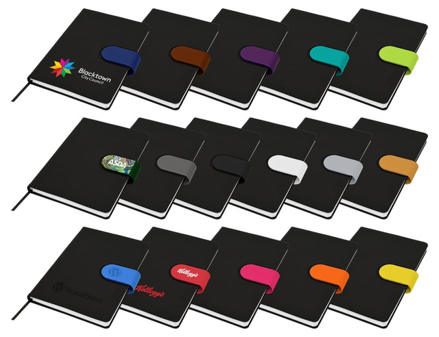 A collection of black Cordoba A5 notebooks with various coloured bands and logos displayed on the covers.