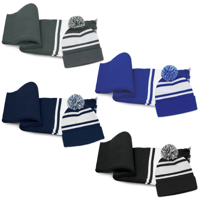 A beanie with a pom pom and a matching scarf set in grey, blue, navy, and black variations. Each set features striped detail.
