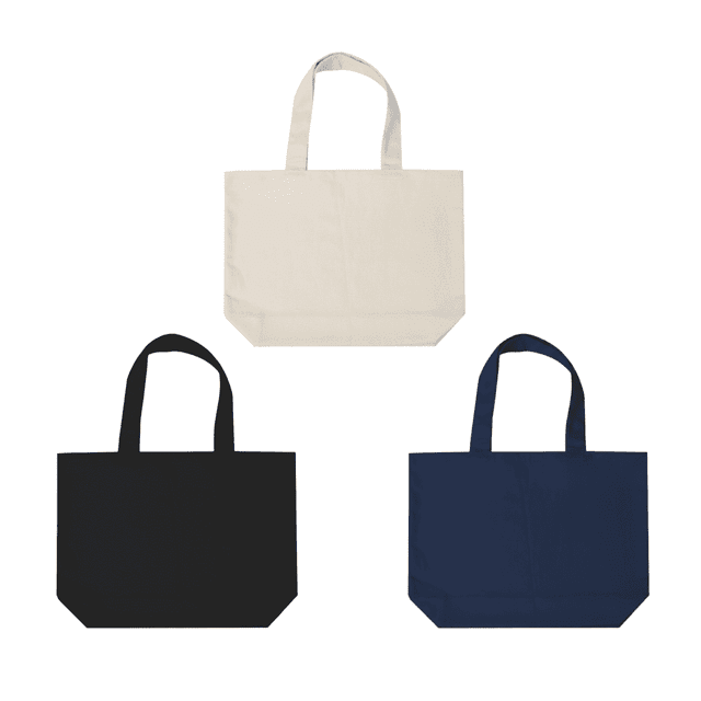 A collection of three tote bags in cream, black, and navy, each featuring handles and a logo.