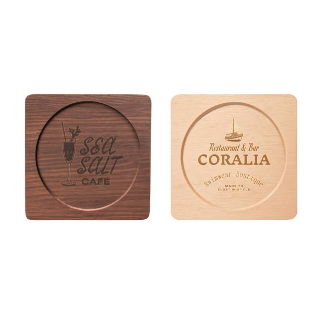 A wooden coaster set featuring a square shape with a circular center, in dark and light wood finishes.