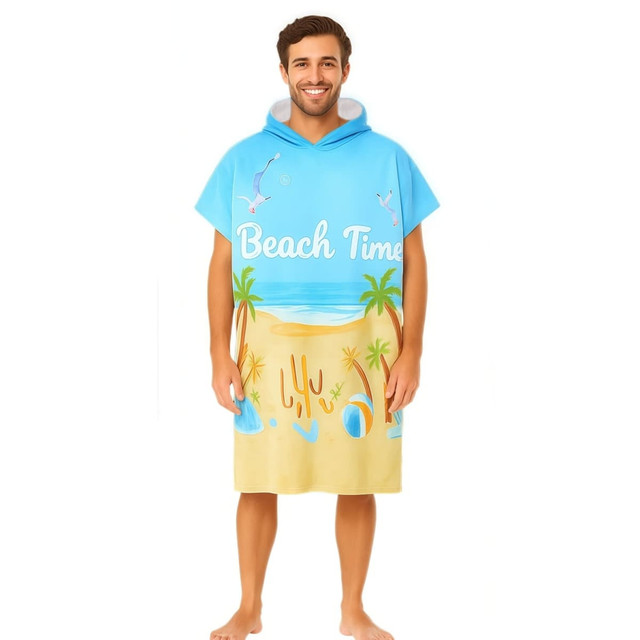 A blue and sandy-coloured surf poncho towel with a hood, featuring a beach scene and palm trees.