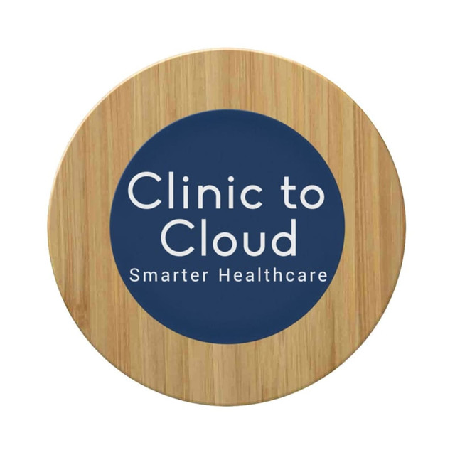 A round bamboo wireless charger featuring a dark circular centre with text and a light wooden outer edge.