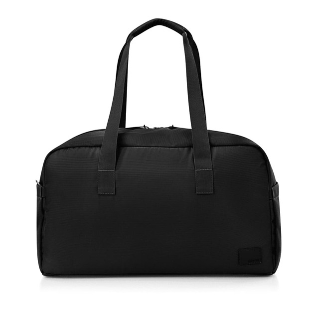 A black duffle bag with two top handles and a side pocket, featuring a logo on the side.