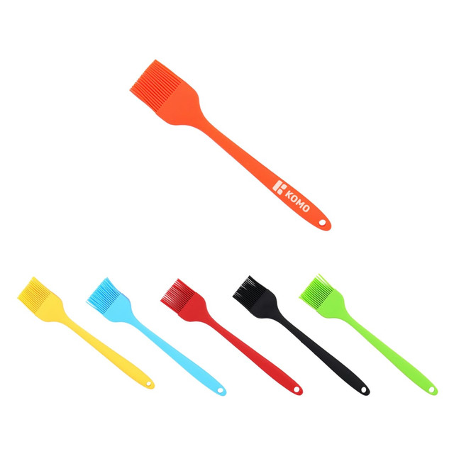 A set of pastry brushes in orange, yellow, blue, black, and green, featuring a logo on one brush.