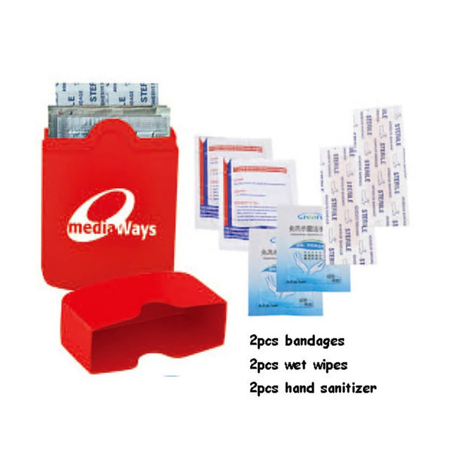 A red cleaning set containing bandages, wet wipes, and hand sanitiser, along with packaging and a logo.
