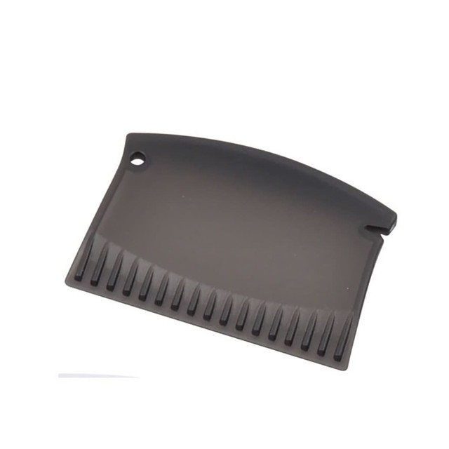 A black ice scraper with a curved edge and ridged surface, featuring a hole for attachment.
