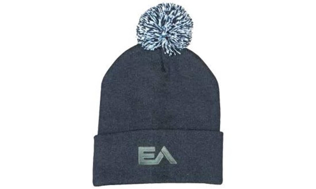 Acrylic beanie in navy blue with a pom pom on top and a logo on the front.