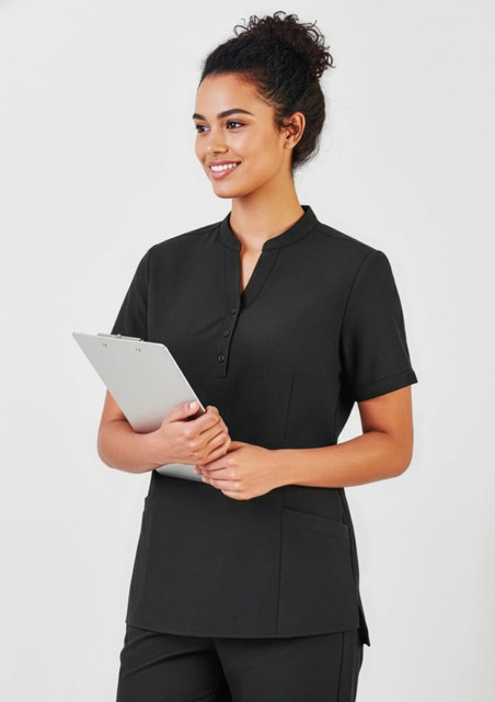 A black women's tunic with a short collar and pockets, featuring a model holding a clipboard.