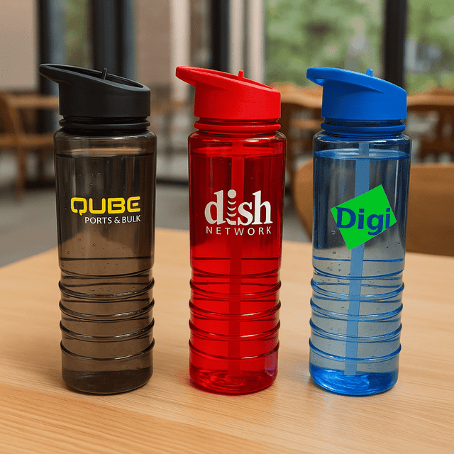 A drink bottle trio featuring black, red, and blue Tritan bottles with logos. Each has a flip-top lid and a textured grip.