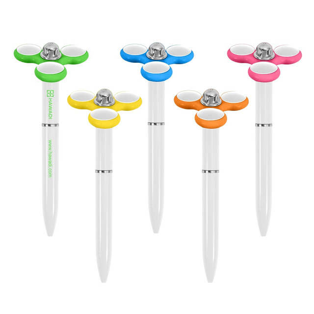 A collection of five white fidget pens in green, blue, yellow, and orange, each featuring a logo.