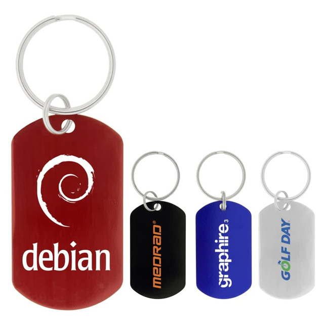 A set of four dog tag keychains in red, black, blue, and silver, each with a keyring and featuring various logos.
