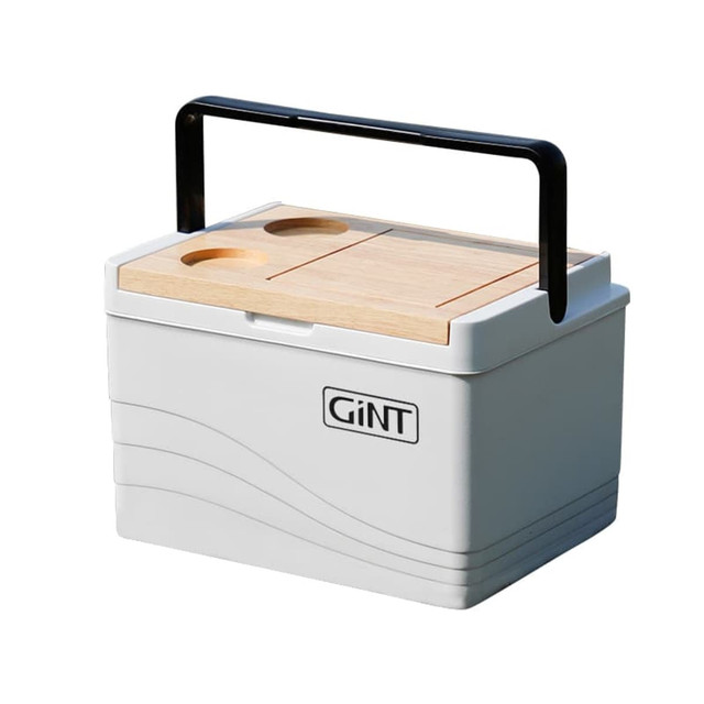 A white cooler box with a wooden lid and black handle, featuring two circular cut-outs on the top. It has a logo.