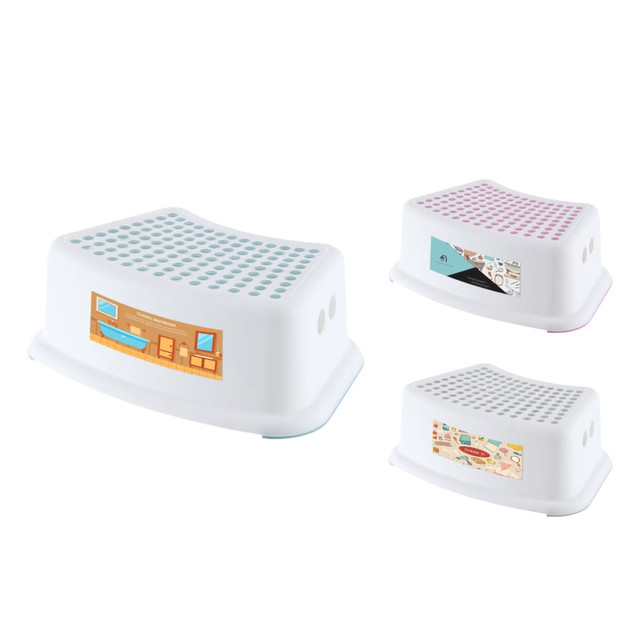 A white step stool with a textured surface, featuring pink and blue accents and various decorative designs.