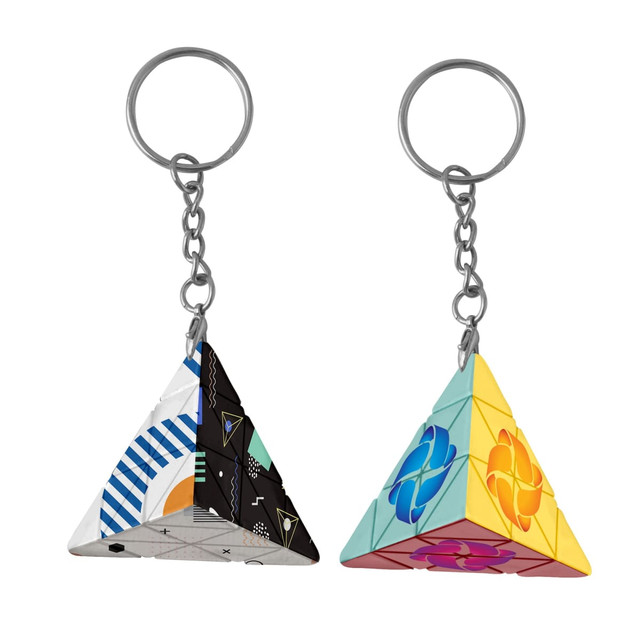 Pyramid-shaped keyrings in vibrant colours with geometric designs, featuring a metallic keychain attachment.