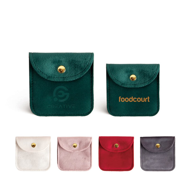 A square velvet jewellery pouch available in green, white, pink, red, and grey, featuring a logo.