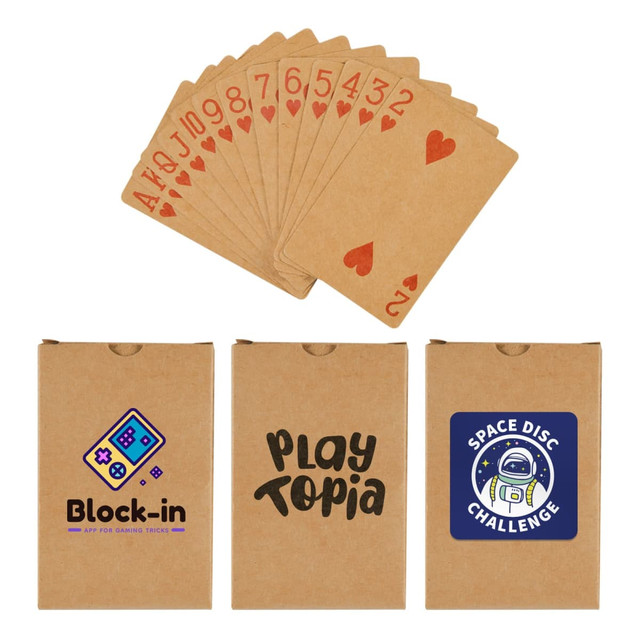 A set of recycled playing cards displayed with various game boxes featuring designs and colors on the packaging.