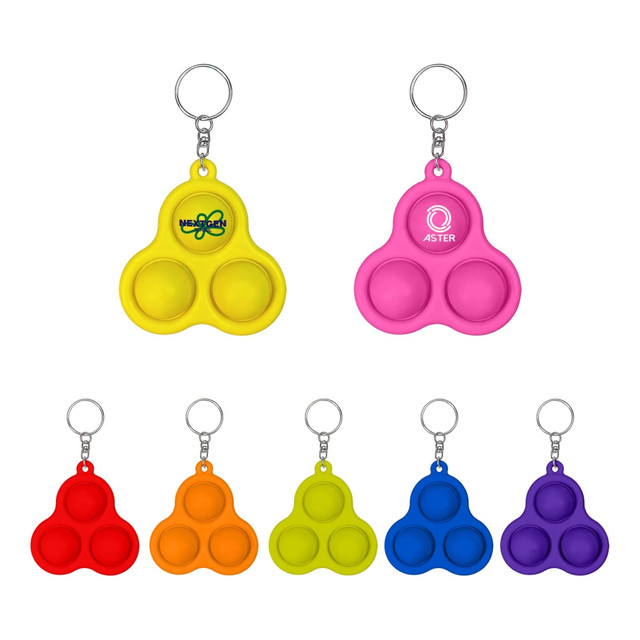 A trio of bubble-popping keychains in yellow, pink, orange, green, blue, and purple, each with a keyring attachment.
