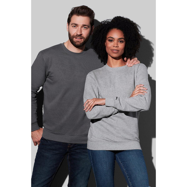 A grey men's sweatshirt worn by a man, paired with a light grey women's sweatshirt. Both models are smiling.