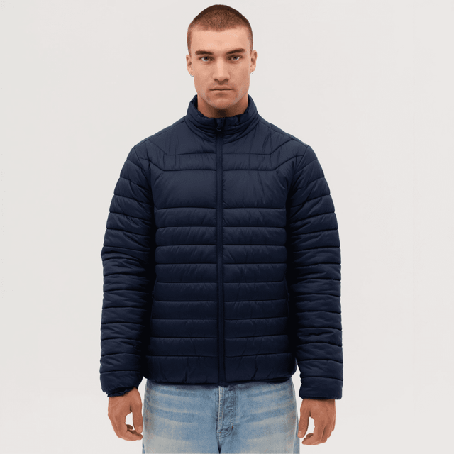 A navy puffer jacket with a high collar and zippered front, displayed on a male model against a plain background.