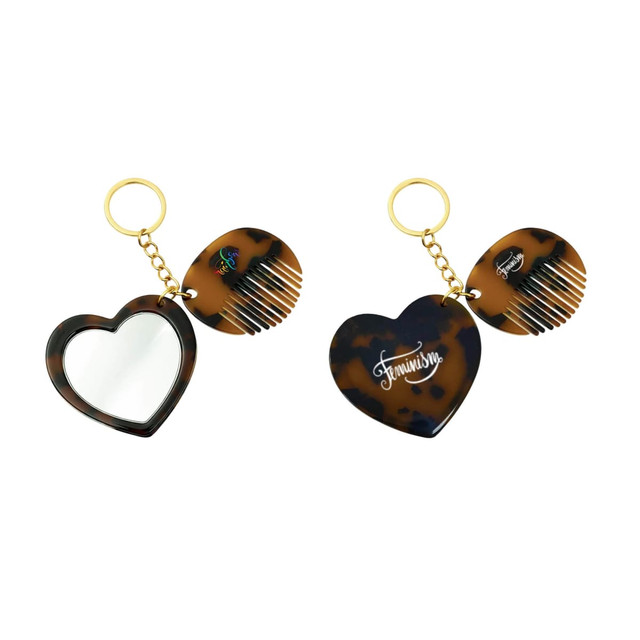 A mini acetate mirror comb keyring in tortoiseshell design with a gold chain and heart-shaped features.