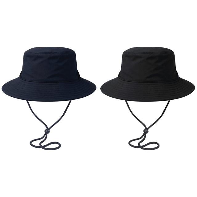 Two surf hats are displayed, one in navy blue and the other in black, both featuring chin straps and a logo.