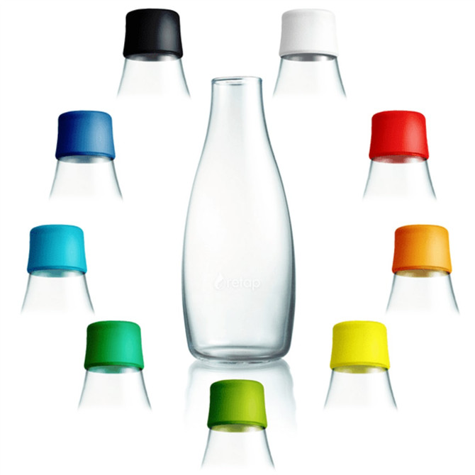 A drink bottle made of glass with a sleek design, featuring a transparent body and assorted coloured caps.