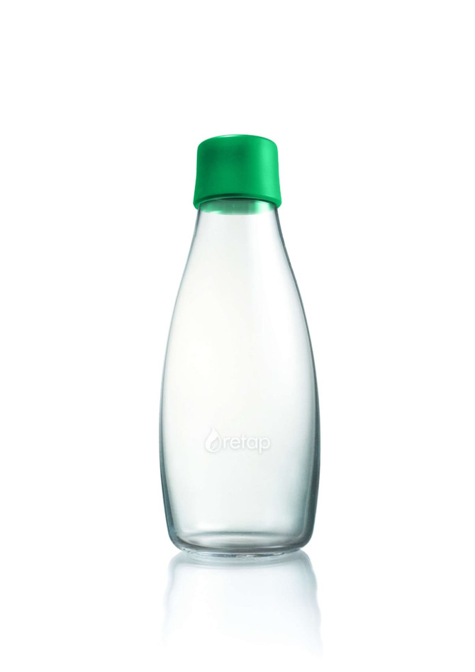 A drink bottle made of clear glass with a green silicone cap, featuring a branding logo.