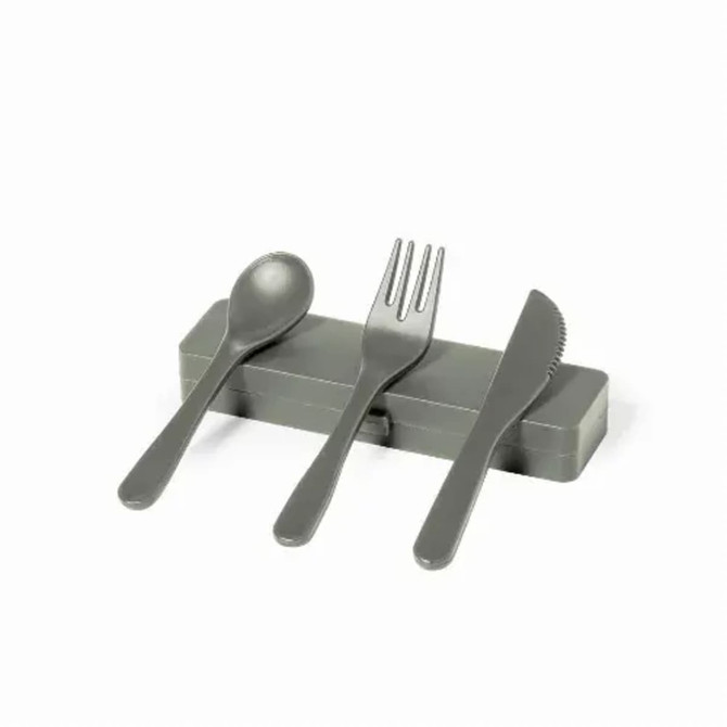 A set of grey cutlery including a spoon, fork, and knife, resting on a matching holder.