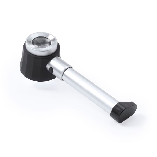 A magnifier with a black and silver design, featuring a circular lens and an ergonomic handle.