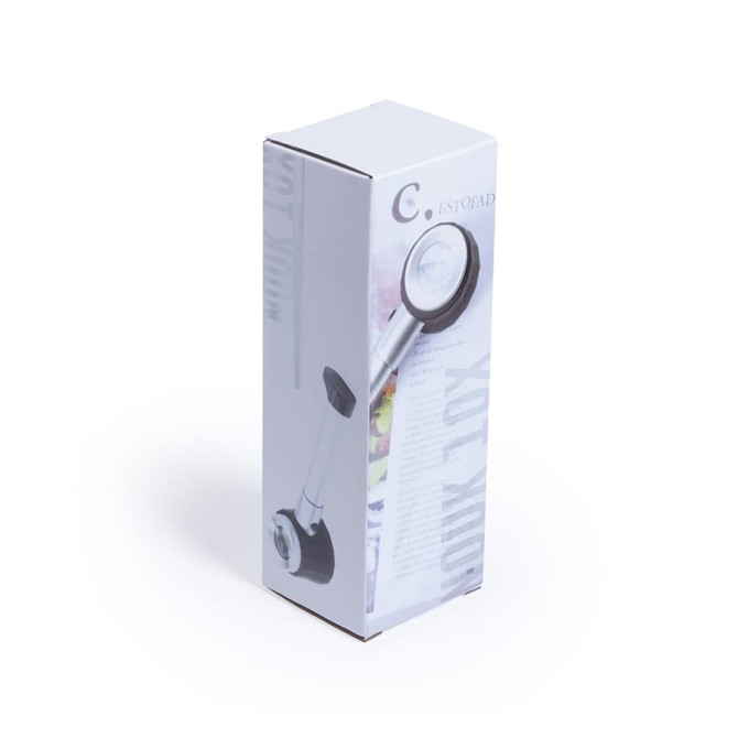 A magnifier in a rectangular box, featuring a round lens and a handle, primarily in black and silver. Box features branding.