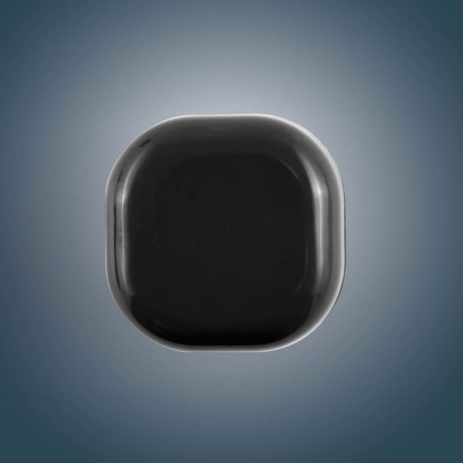 A Cube Lip Balm in a sleek, rounded square container with a glossy black finish.