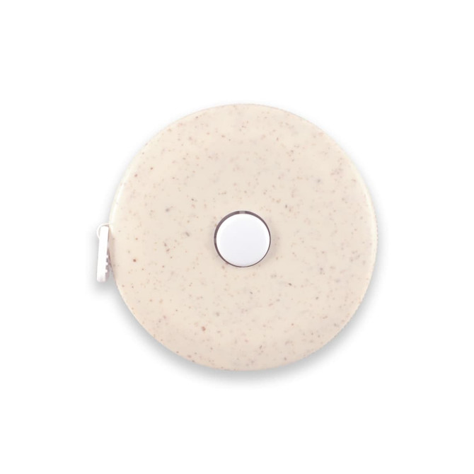 A beige circular tape measure with a smooth surface and a central button, featuring a logo.