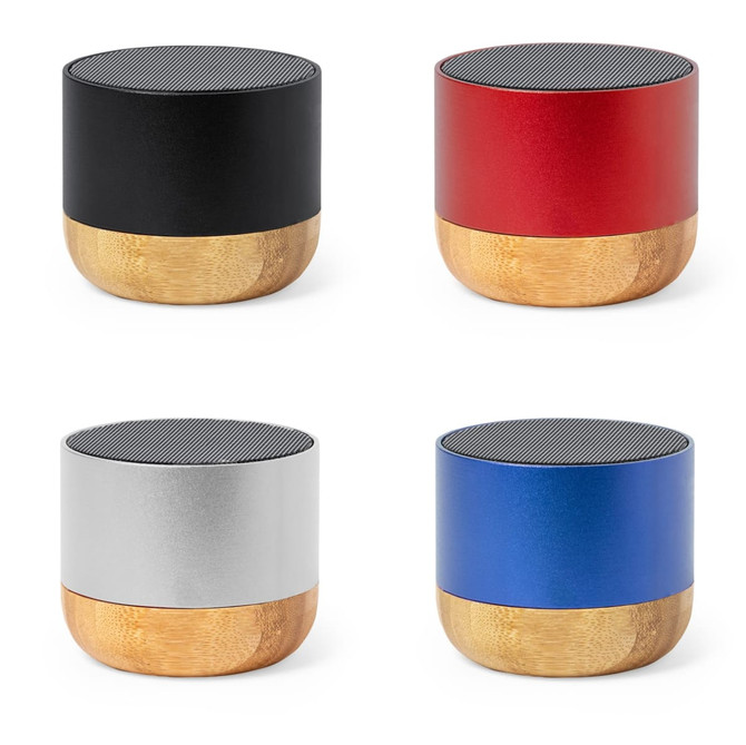 A collection of speakers in black, red, silver, and blue, featuring bamboo bases and metal tops. Each speaker has a logo.