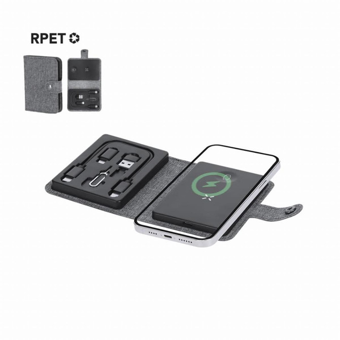 A grey wireless charger with a phone displaying a charging indicator and a storage compartment for accessories.