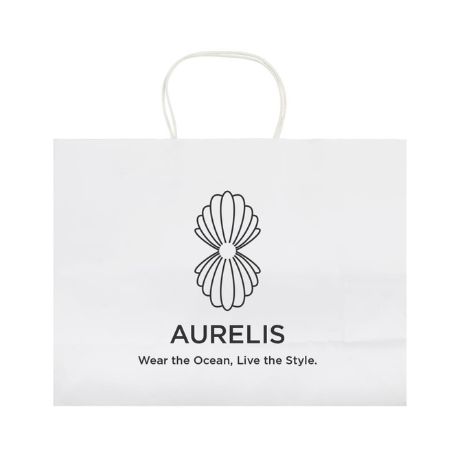 A large white paper bag with a decorative logo design and handles. Features minimalistic branding and text.