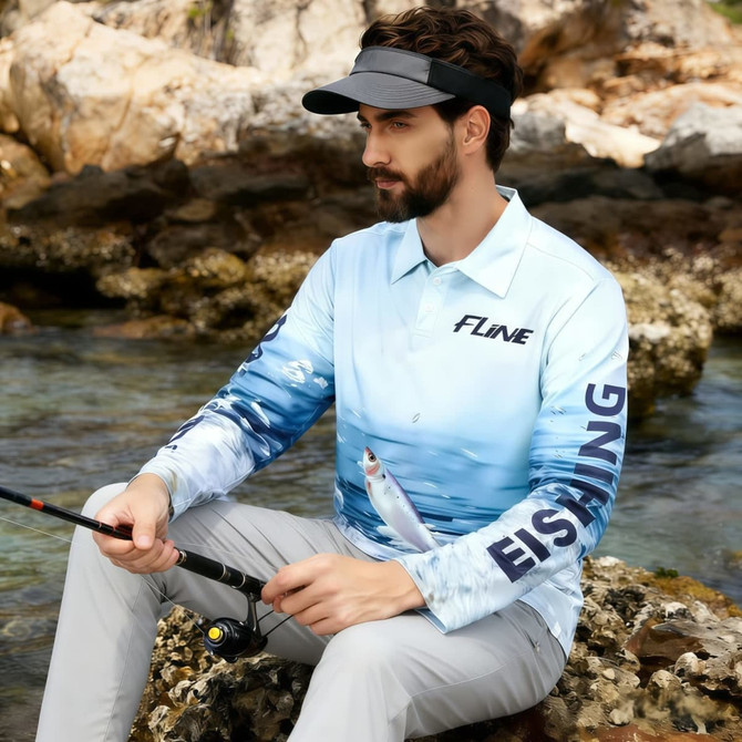 A long-sleeve fishing polo in blue and white, featuring a fish design and a logo on the chest.