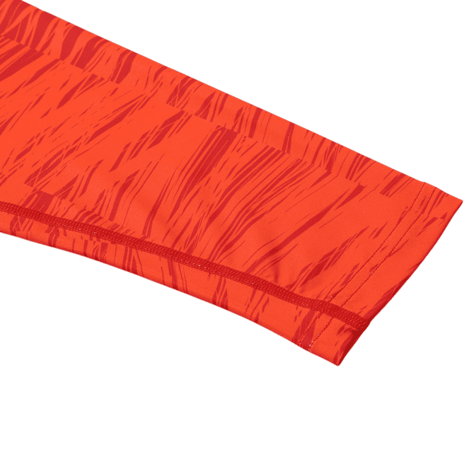 A bright red polyester spandex fabric featuring a textured pattern, ideal for sun protection hoodies.
