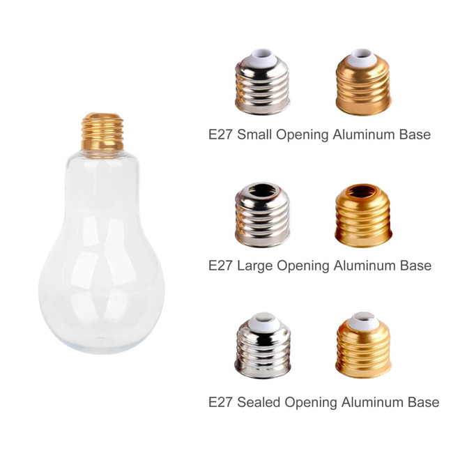 A drink bottle in a bulb shape, clear plastic with a gold metal screw cap and various metal bases beside it.