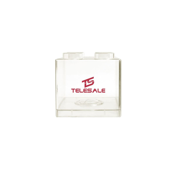 A clear square block coin bank with two stud-like tops and a logo on the front.
