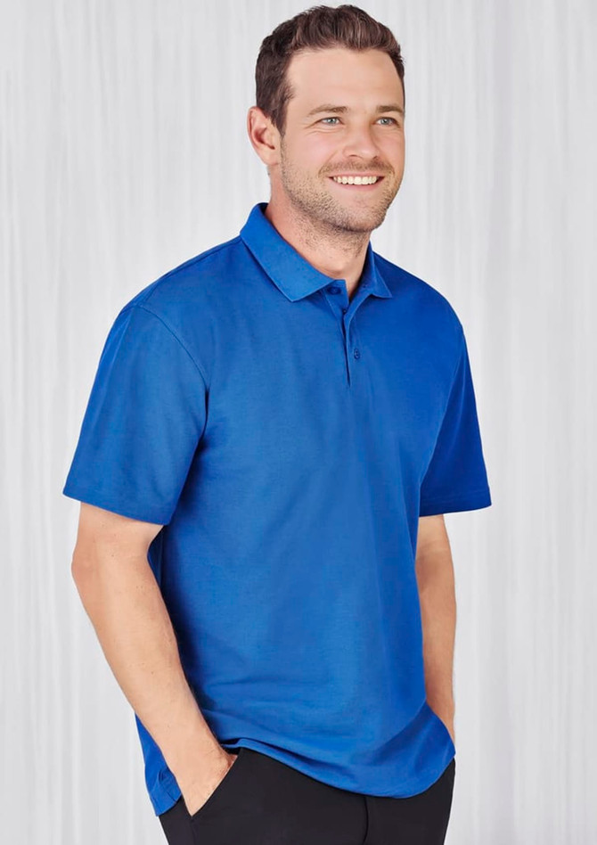 A blue men's polo shirt with a collar and short sleeves, featuring a logo on the chest.