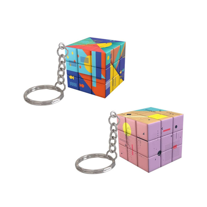 A set of colourful 3x3 puzzle cubes attached to keyrings, featuring vibrant geometric designs in blue, pink, and yellow.