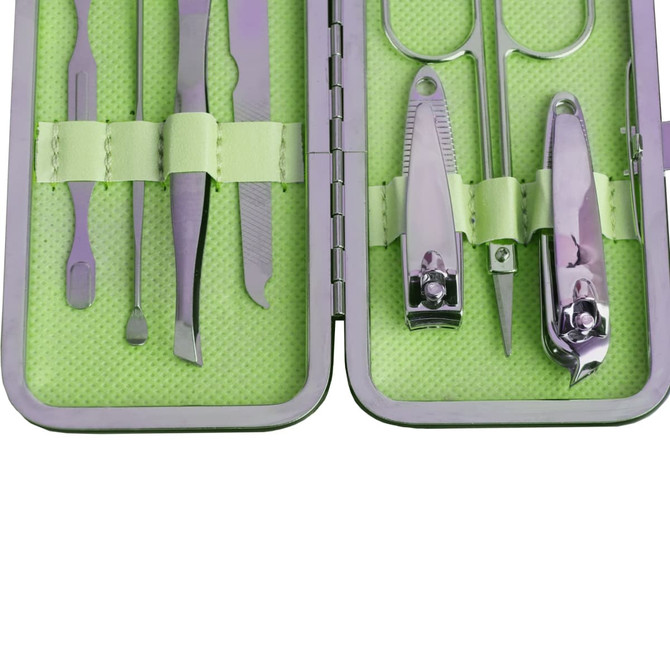A stylish manicure set featuring stainless steel tools in a green case. Includes scissors, tweezers, and nail clippers.