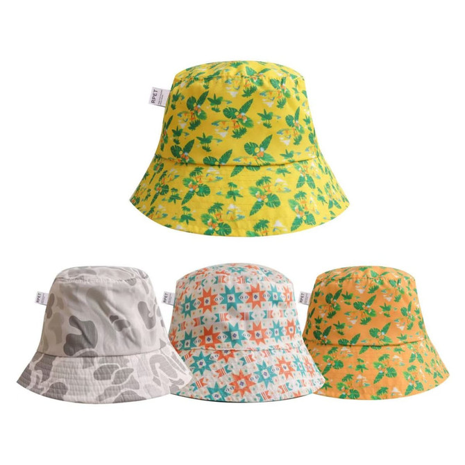 Four RPET bucket hats in yellow with green patterns, grey with abstract designs, white with colourful stars, and orange with vibrant motifs.