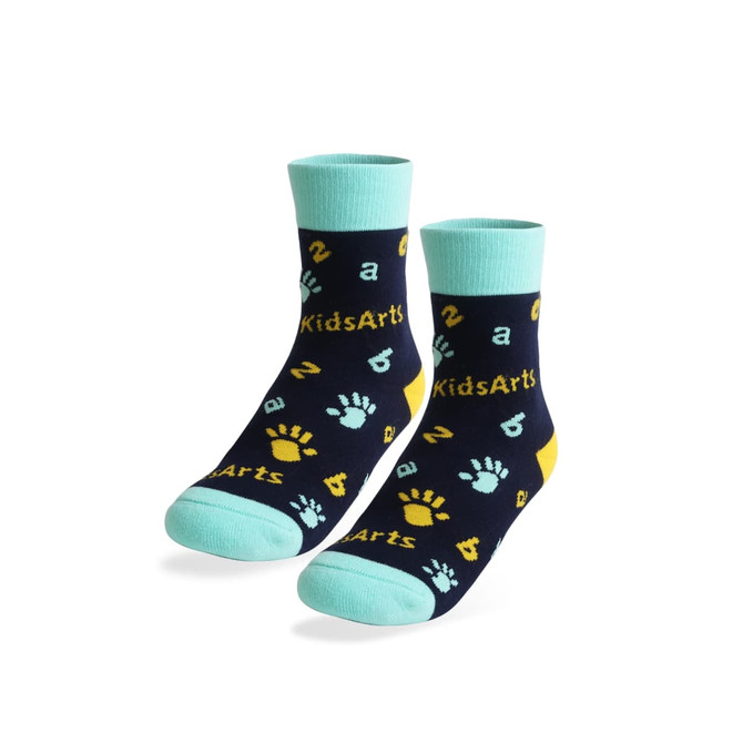 Two pairs of navy and mint socks with a playful pattern featuring paws and letters. Includes a logo.