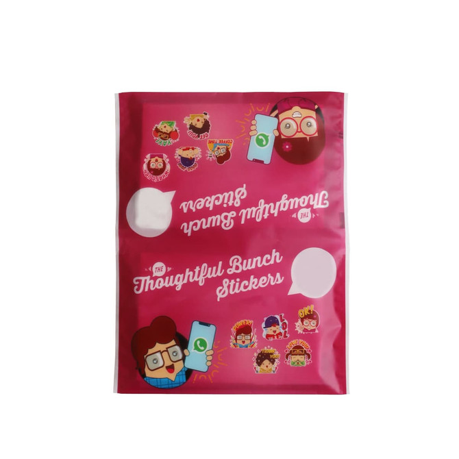A pink packet of pocket tissues featuring cartoon stickers and a logo, with white tissue compartments.