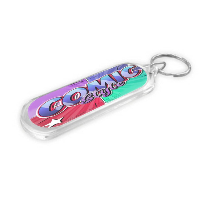 An oblong acrylic keyring in vibrant pink and green with a decorative design and attached metal keyring.