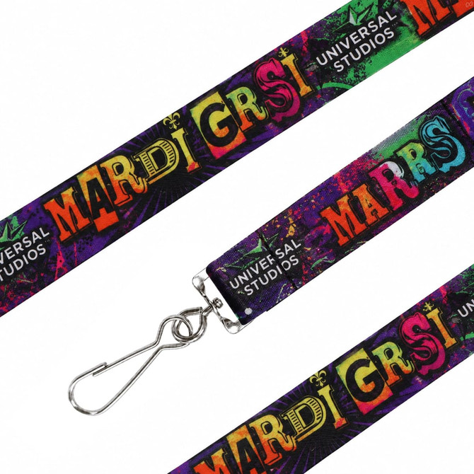 A colourful sublimation lanyard featuring vibrant 'Mardi Gras' text and a metal clip for attachment.